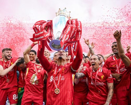LIVERPOOL, ENGLAND - MAY 25: Virgil van Dijk of Liverpool lifts the trophy after the Premier League match between Liverpool FC and Crystal Palace FC at Anfield on May 25, 2025 in Liverpool, England. (Photo by Michael Regan/Getty Images/Getty Images For The Premier League)